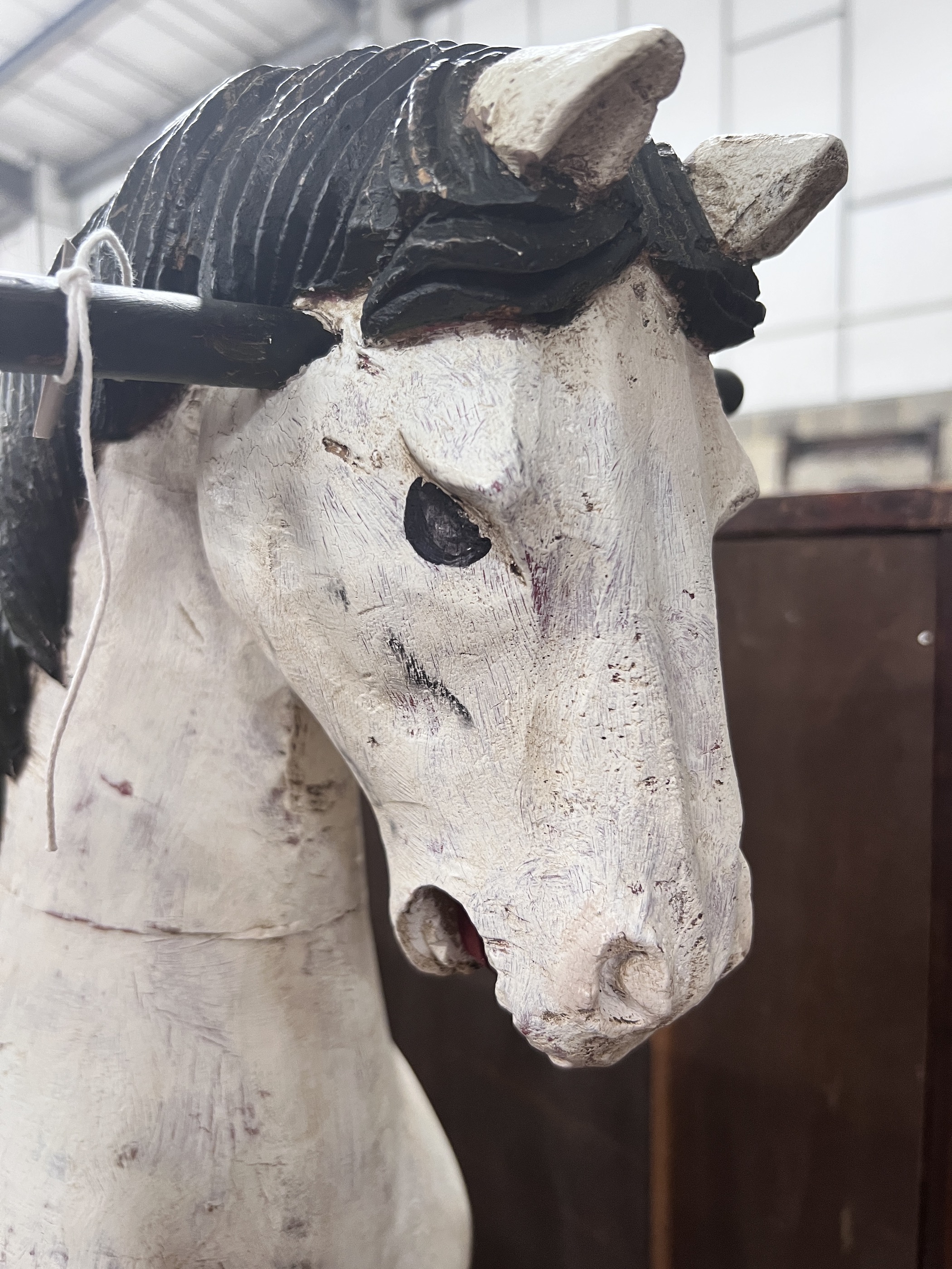 A Victorian style painted hardwood rocking horse, height 80cm